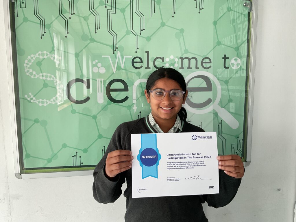 students holding up certificate